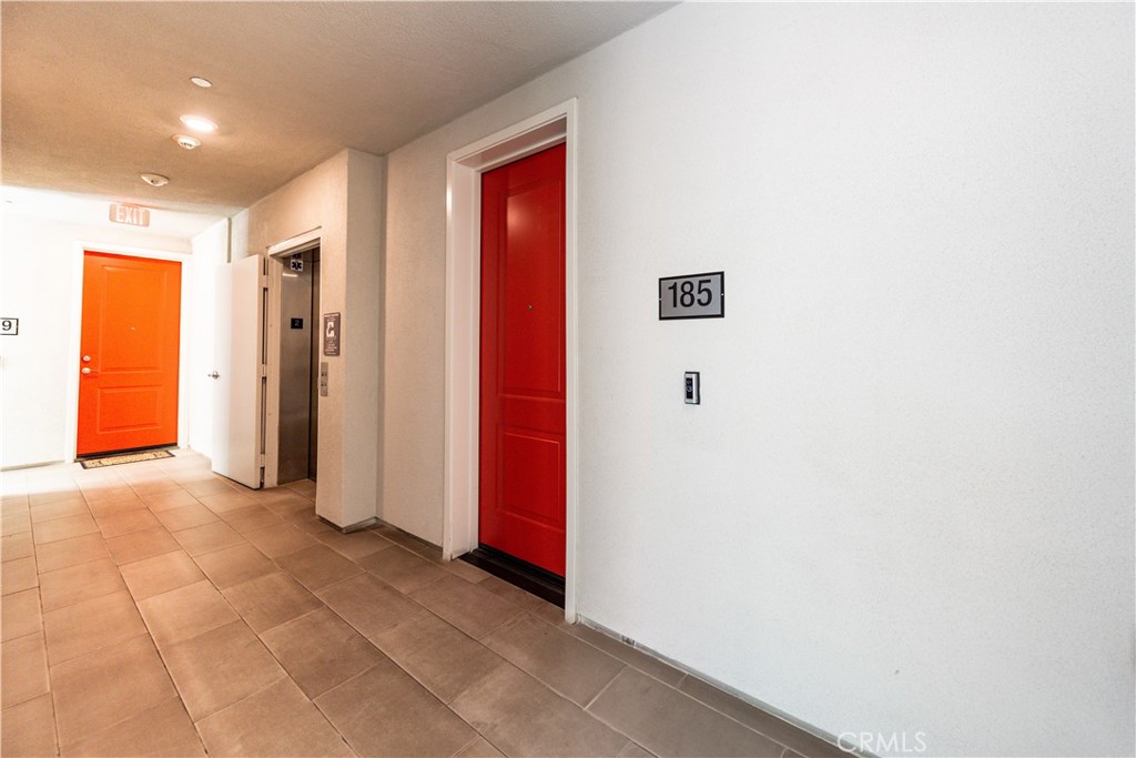 185 Bowery Irvine, CA 92612 - Photo 3 of 29 a view of a hallway with seating area