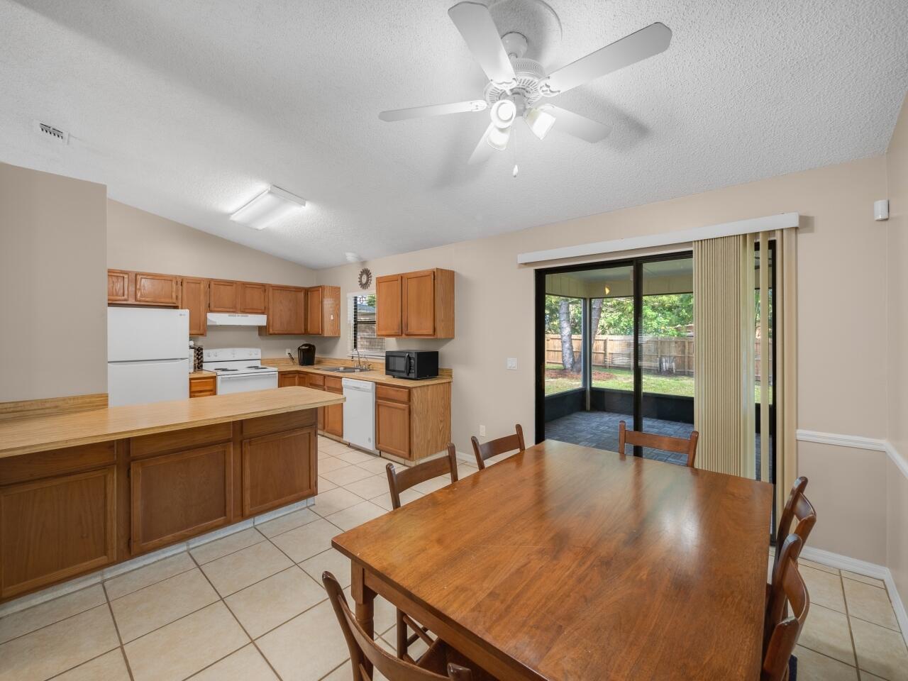 8302 Bayard Road Fort Pierce, FL 34951 - Photo 8 of 17 Kitchen/Dining