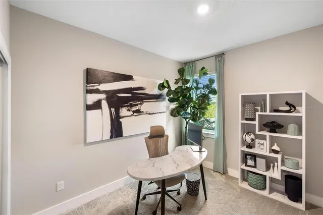a kitchen with granite countertop a stove and a refrigerator