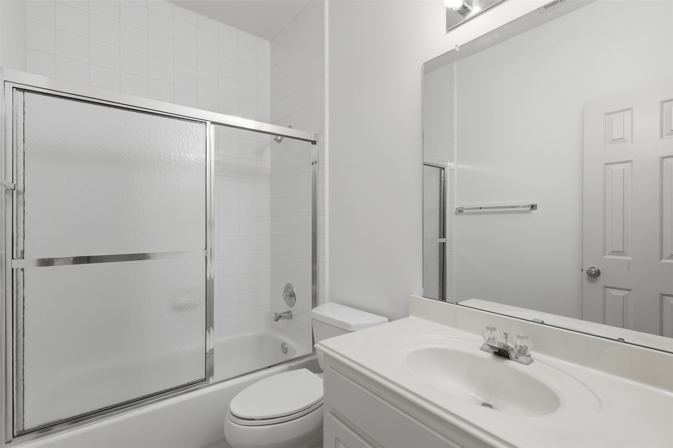 5815 Pheasant Ridge Lane Houston, TX 77041 - Photo 23 of 43 This amazing one-story home features three full bathrooms! The guest bathroom offers tile flooring, a large vanity with plenty of counter space, and a convenient tub and shower combination, perfect for family and guests alike.