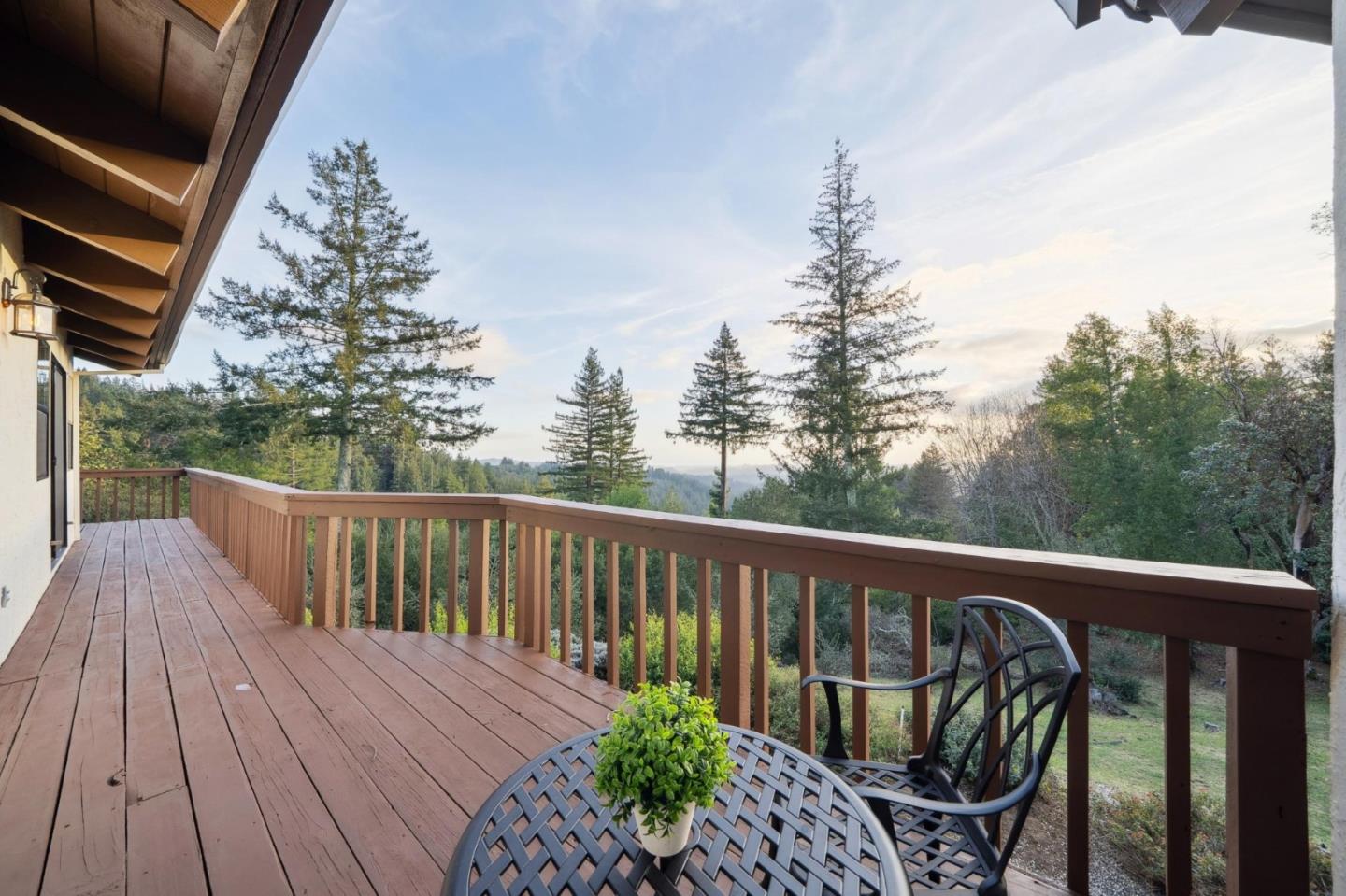 600 Ridge Top Road Los Gatos, CA 95033 - Photo 21 of 81 a balcony with wooden floor stairs and wooden fence