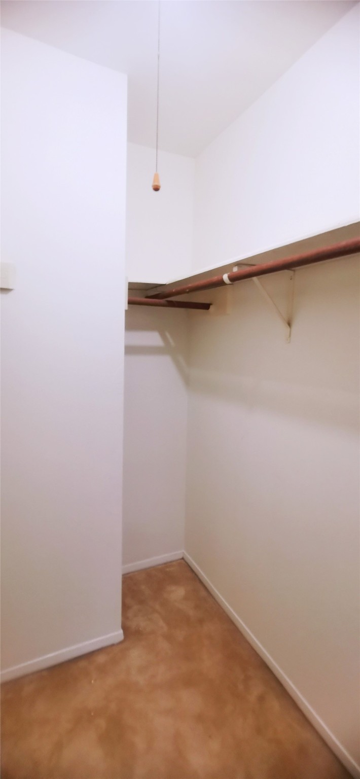 8313 Augustine Drive, Unit B Houston, TX 77036 - Photo 28 of 34 a view of a room with shelf