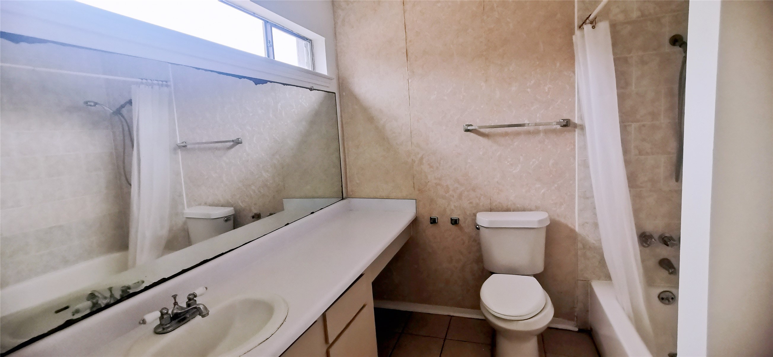 8313 Augustine Drive, Unit B Houston, TX 77036 - Photo 32 of 34 a bathroom with a sink and toilet