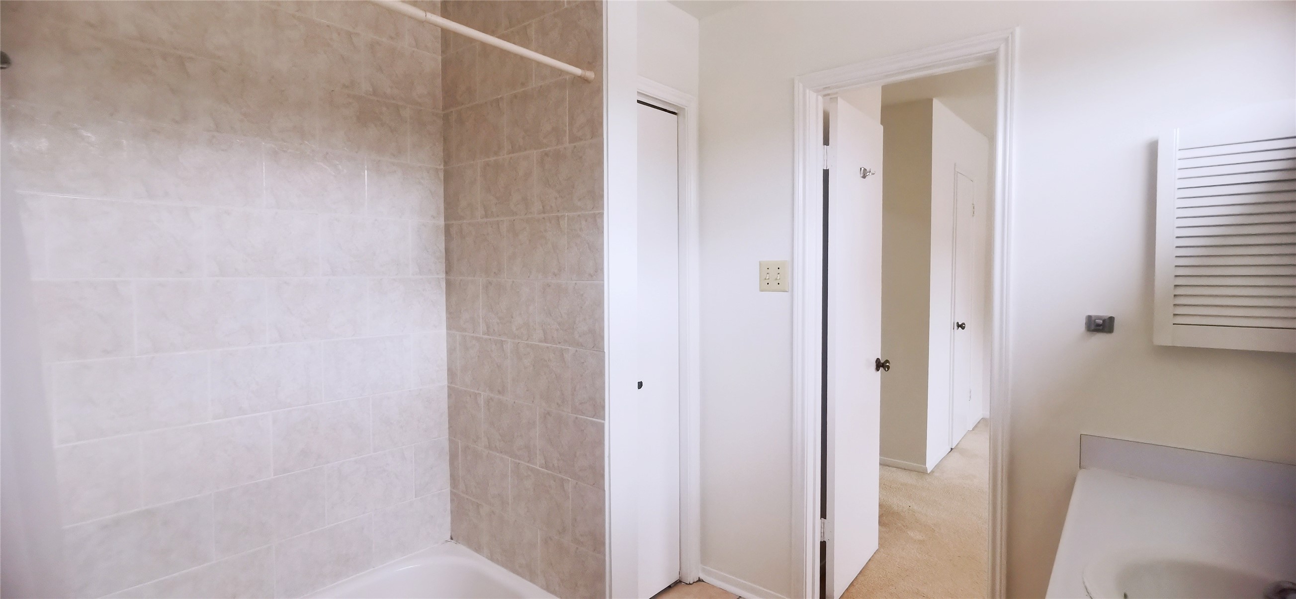 8313 Augustine Drive, Unit B Houston, TX 77036 - Photo 33 of 34 a bathroom with a shower and a glass door