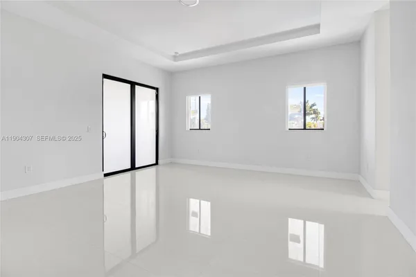 an empty room with windows