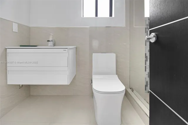 a view of swimming pool with seating area