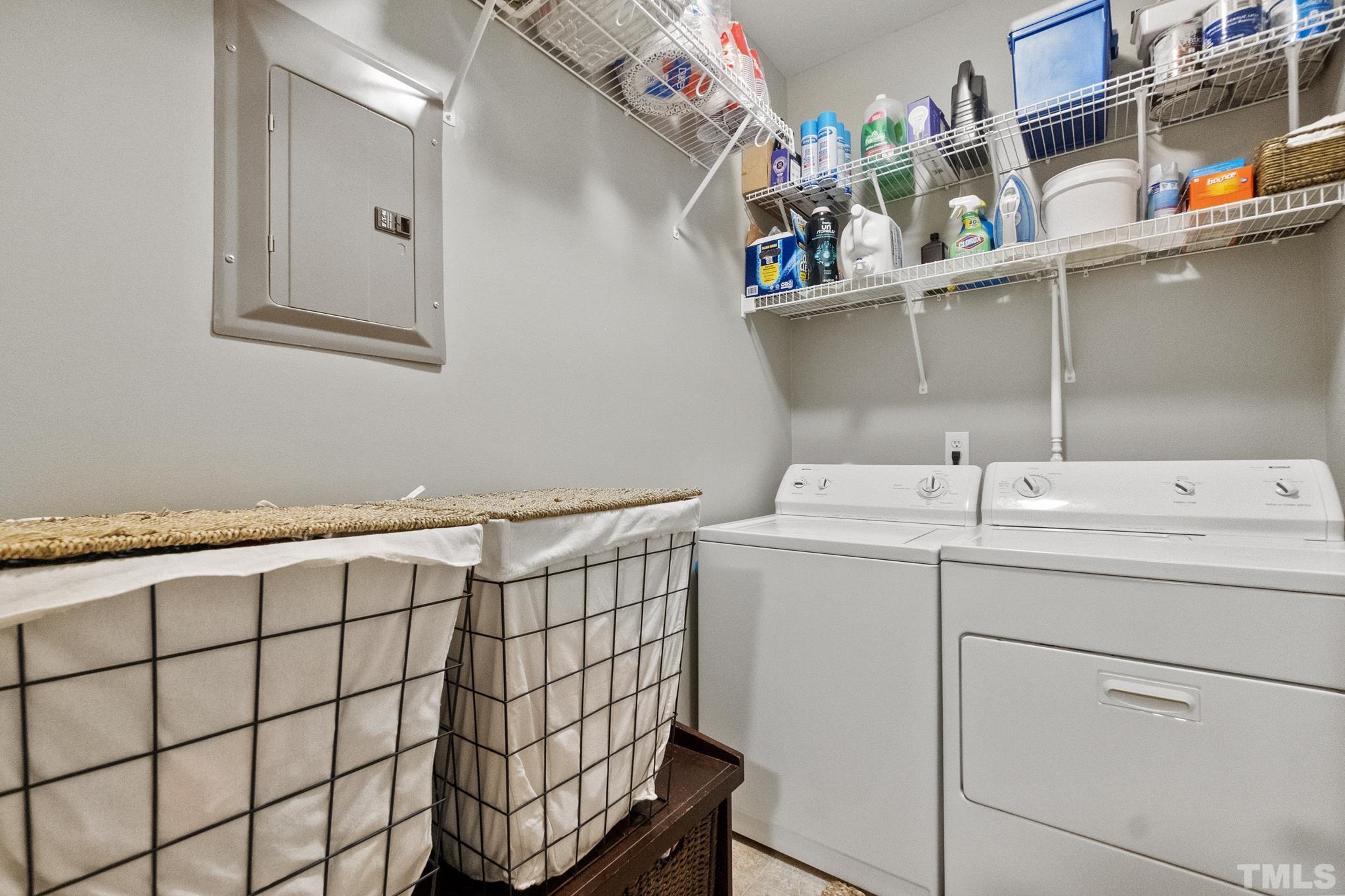 617 Highpark Lane Raleigh, NC 27608 - Photo 22 of 26 a utility room with dryer and washer