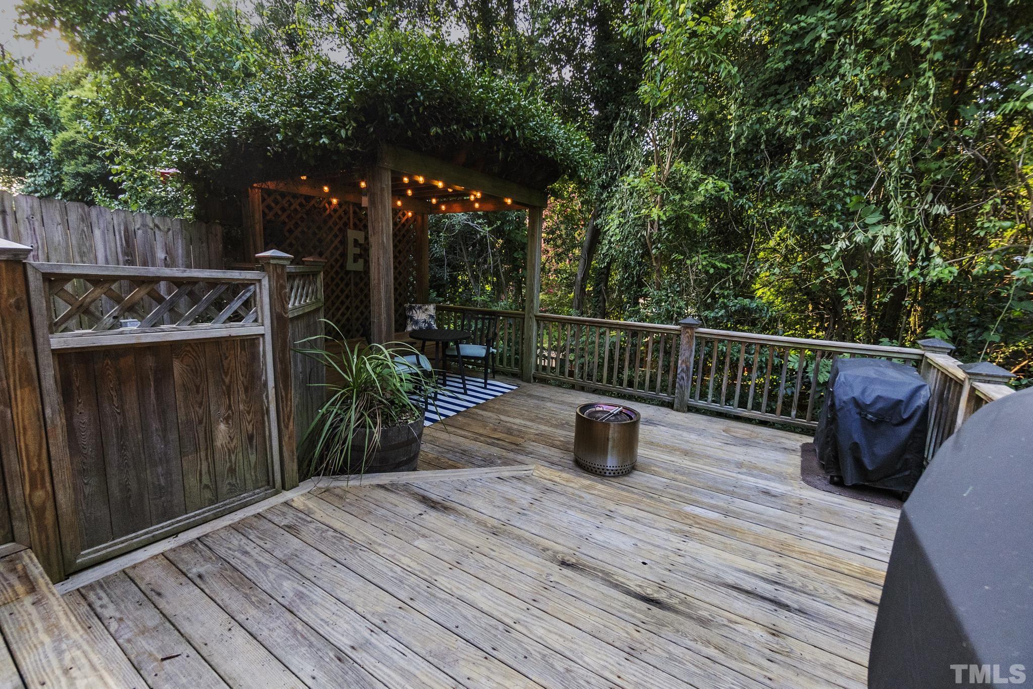 617 Highpark Lane Raleigh, NC 27608 - Photo 23 of 26 a view of deck with patio