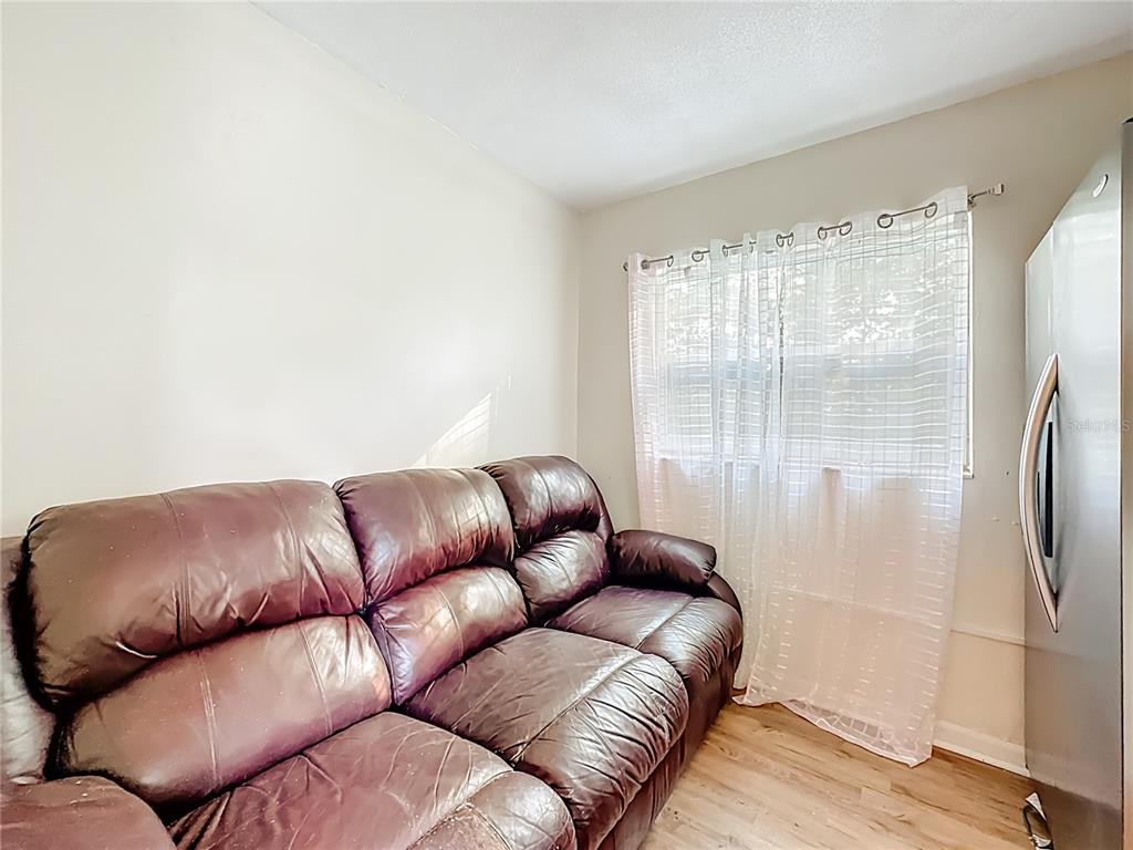 4200 Anderson Road Orlando, FL 32812 - Photo 14 of 63 a living room with furniture