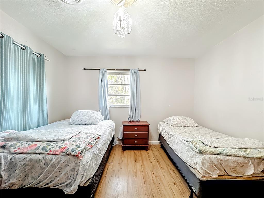 4200 Anderson Road Orlando, FL 32812 - Photo 26 of 63 a bedroom with a bed and a window