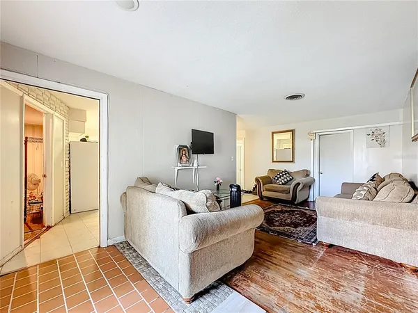 a living room with furniture and a couch