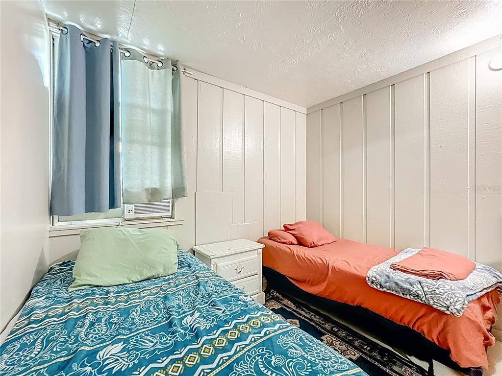 4200 Anderson Road Orlando, FL 32812 - Photo 45 of 63 a bedroom with a bed and a window