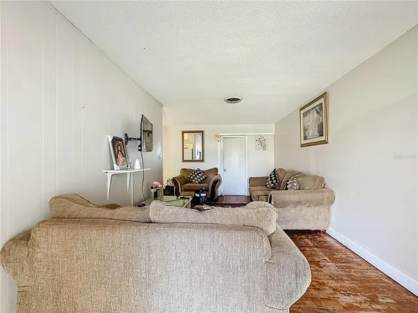 a living room with furniture and a couch