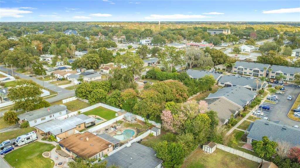 4200 Anderson Road Orlando, FL 32812 - Photo 58 of 63 an aerial view of residential building with parking