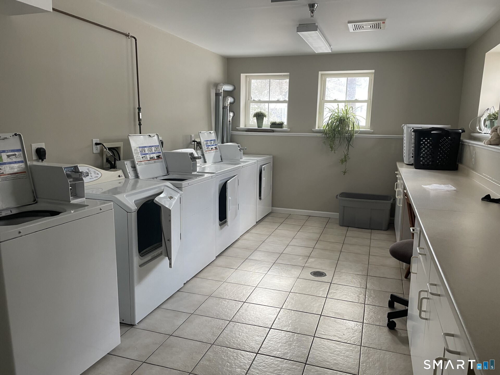 9 Nashville Road, Unit 1A Bethel, CT 06801 - Photo 16 of 18 Large bright Laundry room across hall