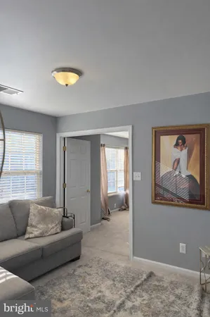 a bedroom with a bed and a table in it