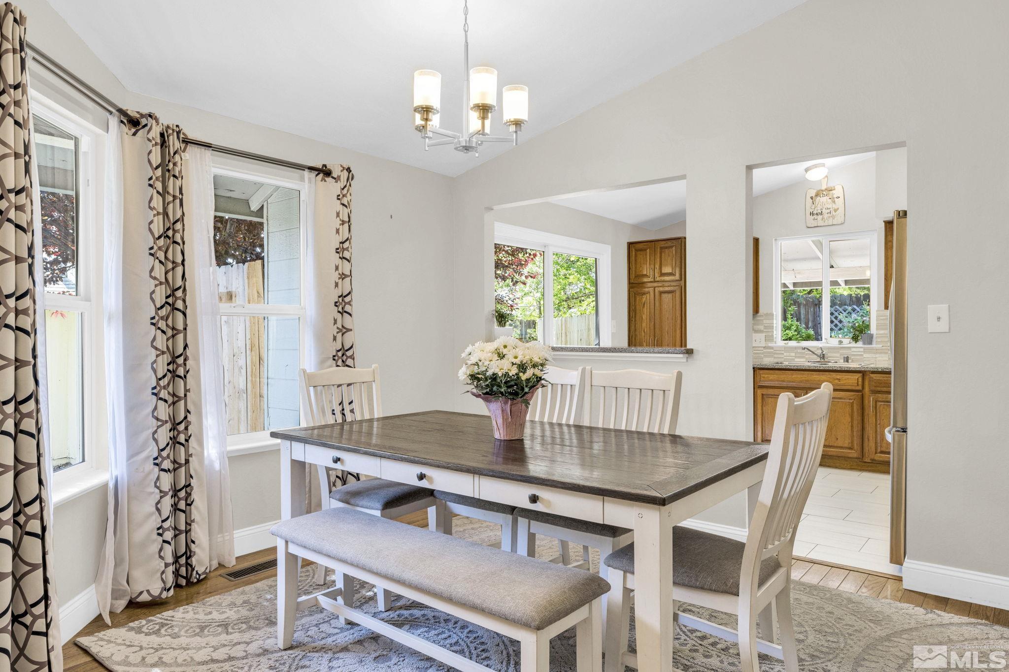 6314 Chesterfield Lane Reno, NV 89523 - Photo 12 of 35 a dining room with furniture and window
