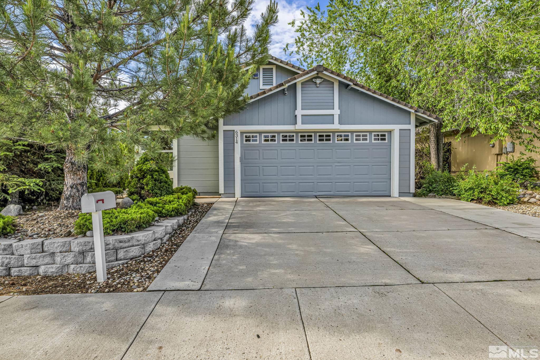 6314 Chesterfield Lane Reno, NV 89523 - Photo 2 of 35 a front view of house with garage