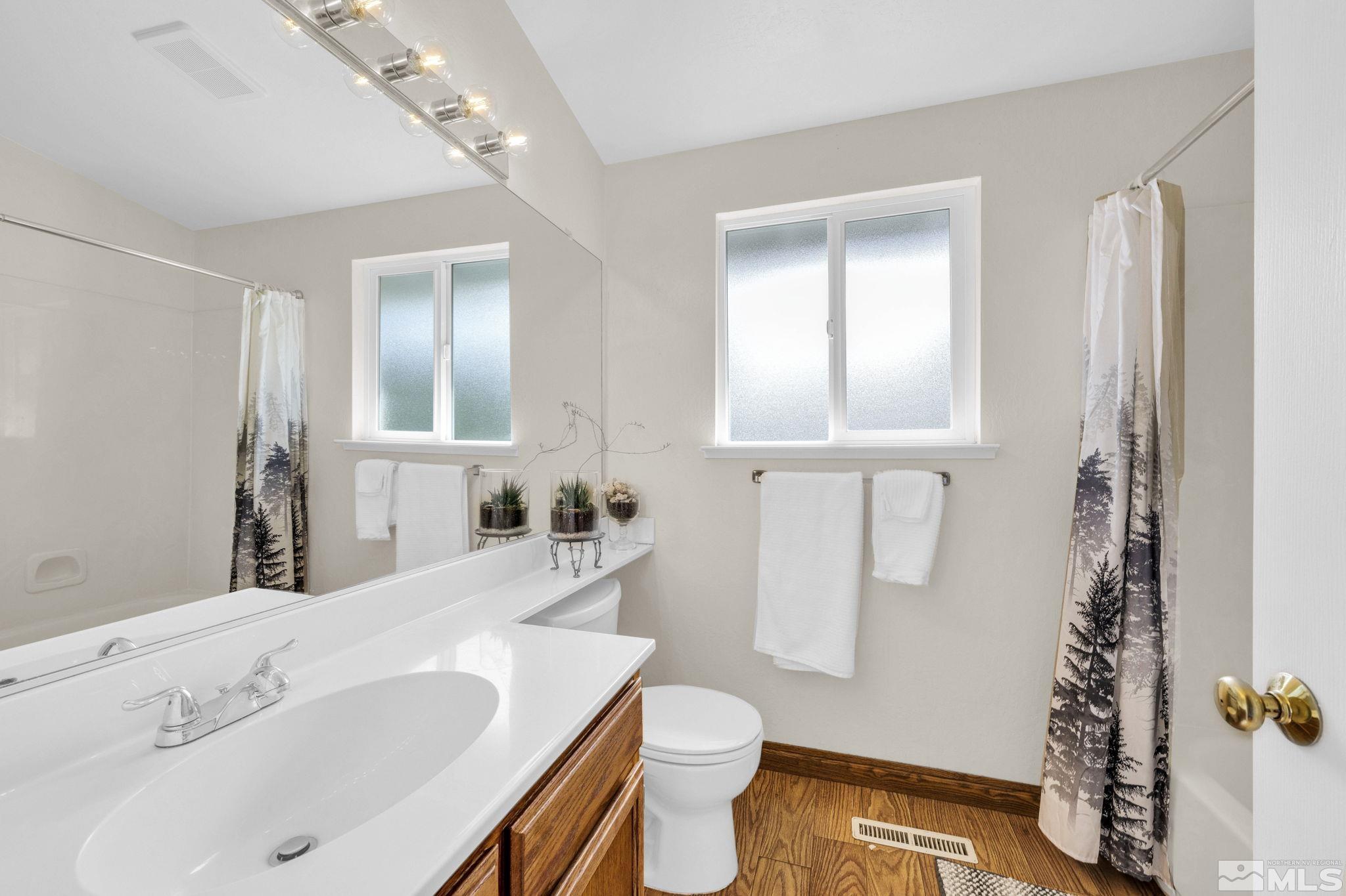 6314 Chesterfield Lane Reno, NV 89523 - Photo 24 of 35 a bathroom with a sink toilet and shower