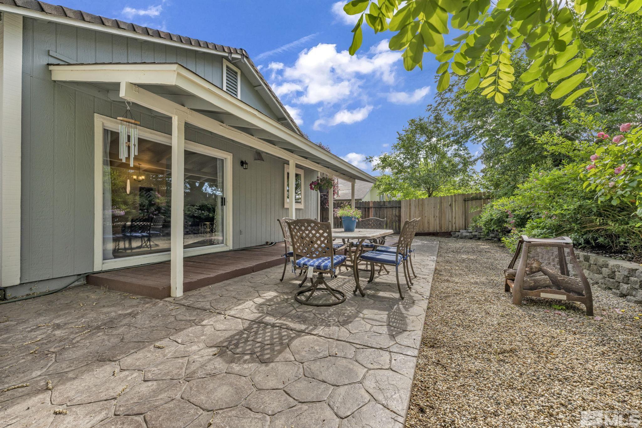 6314 Chesterfield Lane Reno, NV 89523 - Photo 32 of 35 a view of a patio with table and chairs and potted plants