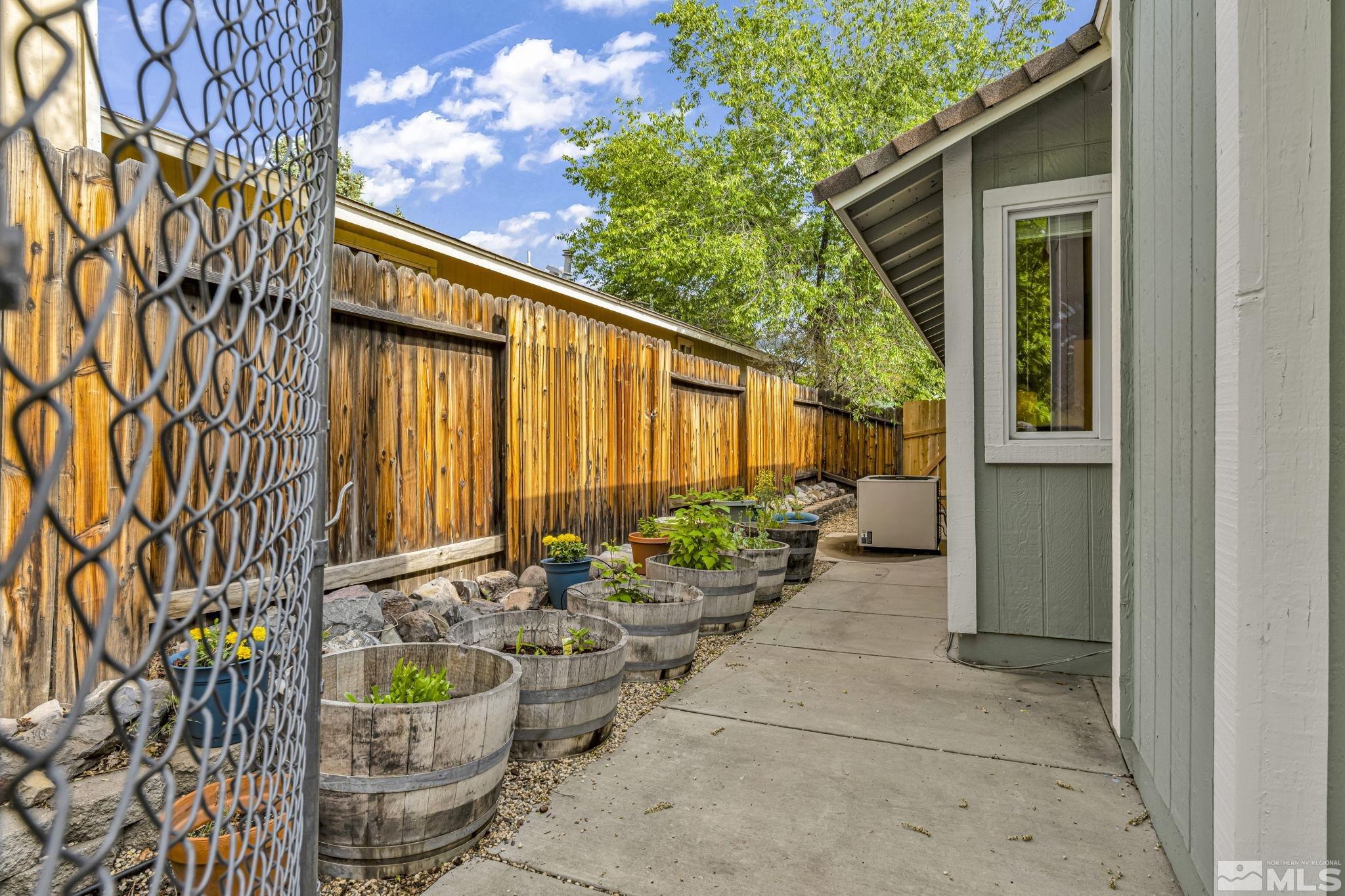6314 Chesterfield Lane Reno, NV 89523 - Photo 34 of 35 a view of a chairs and table in a backyard