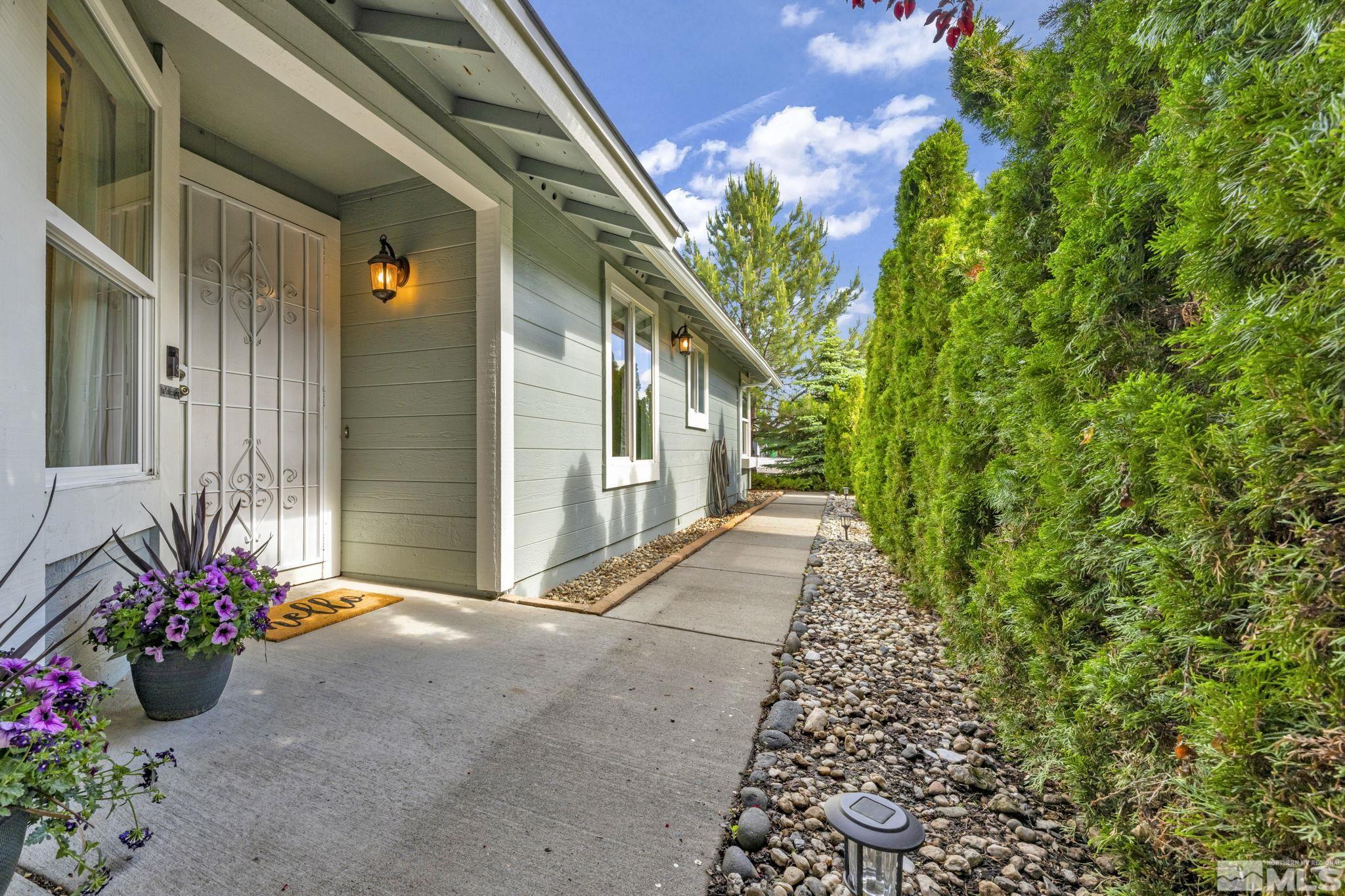 6314 Chesterfield Lane Reno, NV 89523 - Photo 5 of 35 a view of a house with potted plants