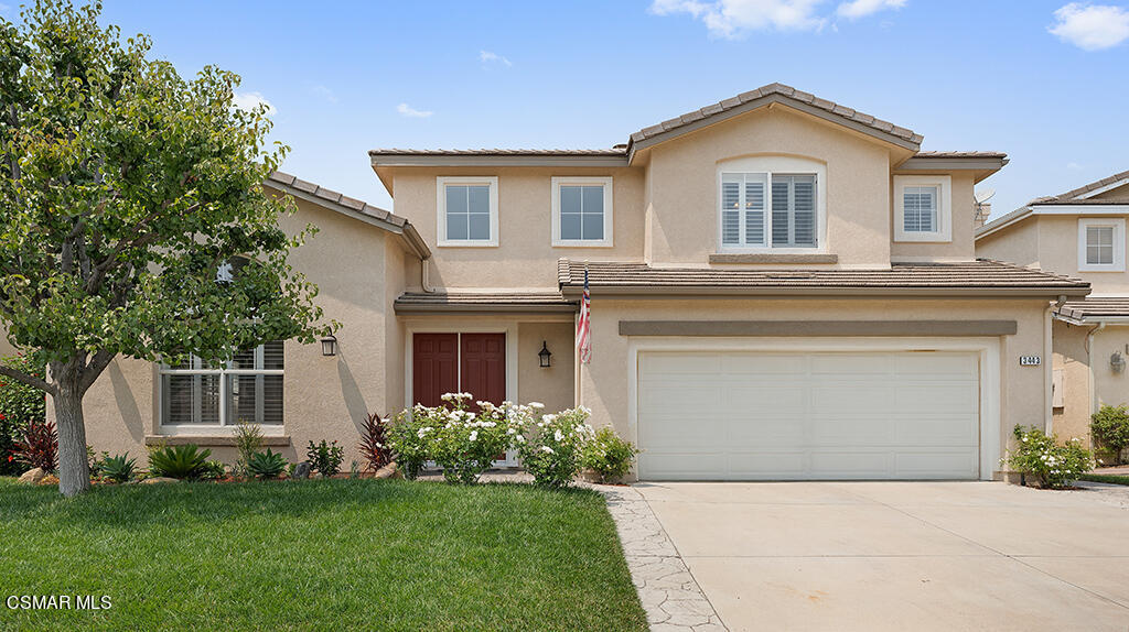3443 Pine View Drive Simi Valley, CA 93065 - Photo 2 of 32 a front view of a house with a garden and yard
