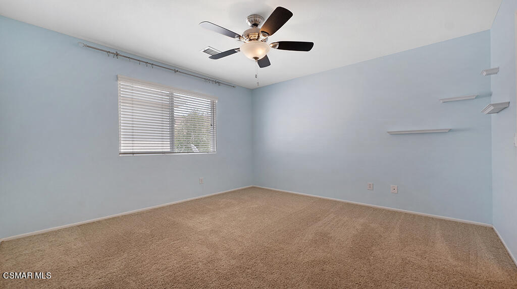 3443 Pine View Drive Simi Valley, CA 93065 - Photo 21 of 32 an empty room with closet and a ceiling fan