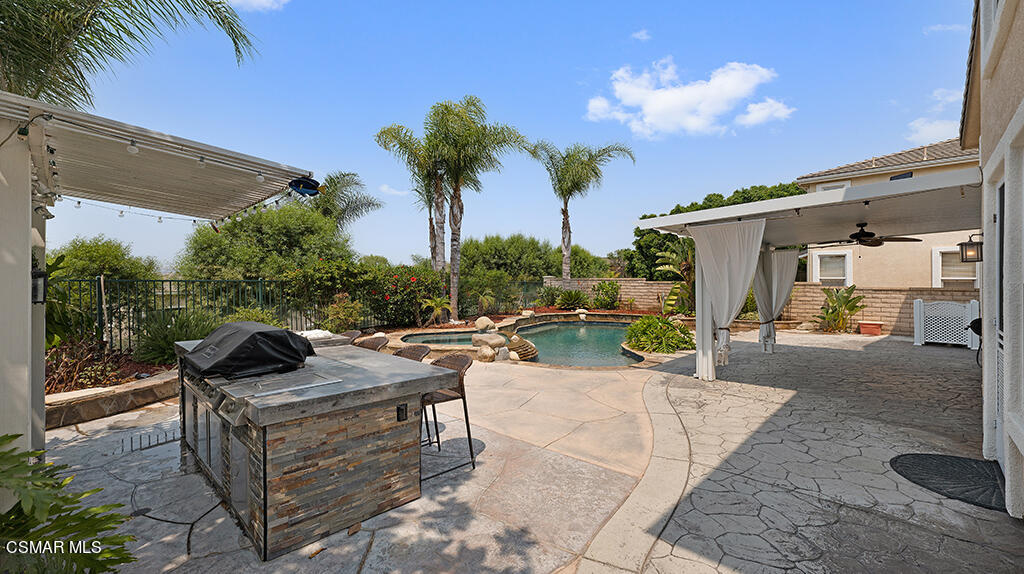 3443 Pine View Drive Simi Valley, CA 93065 - Photo 27 of 32 a view of a backyard with a patio