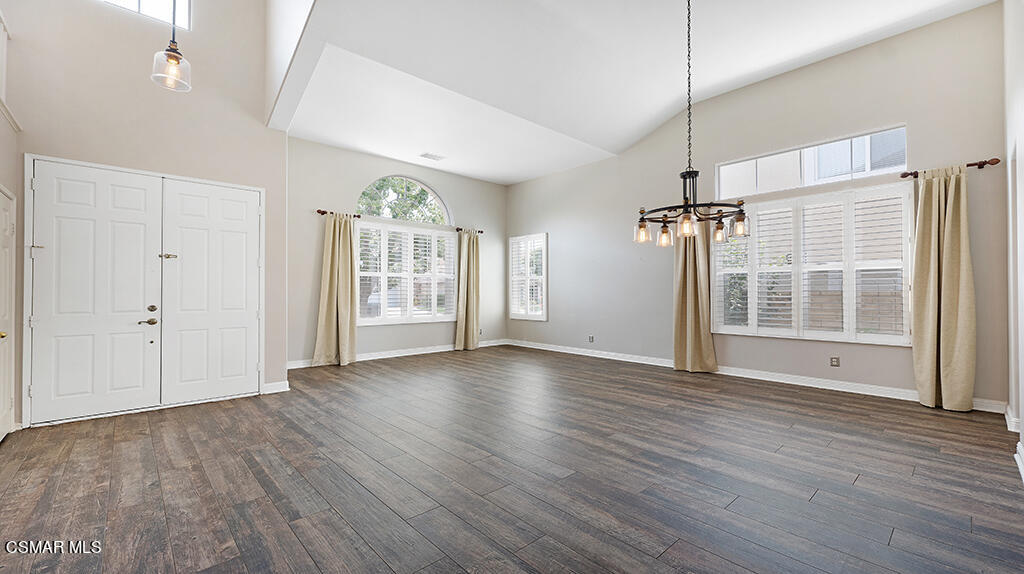 3443 Pine View Drive Simi Valley, CA 93065 - Photo 4 of 32 a view of an empty room with wooden floor and a window