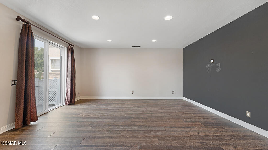 3443 Pine View Drive Simi Valley, CA 93065 - Photo 9 of 32 an empty room with wooden floor and windows