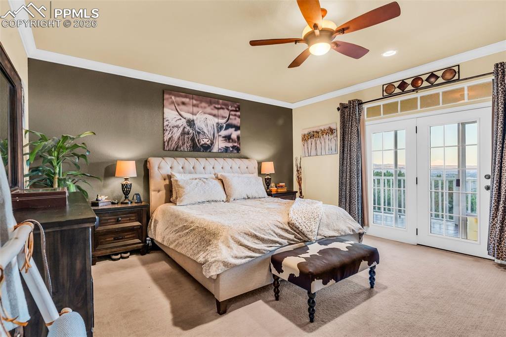 204 Storm Ridge Drive Canon City, CO 81212 - Photo 21 of 50 a bedroom with a bed and a couch