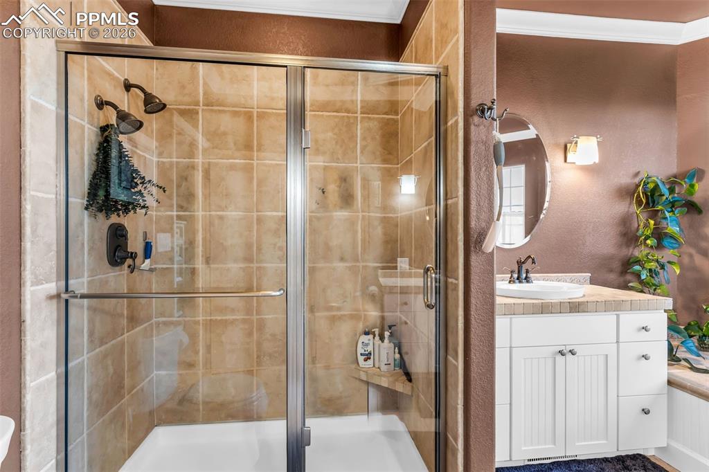 204 Storm Ridge Drive Canon City, CO 81212 - Photo 24 of 50 a bathroom with a shower and a sink