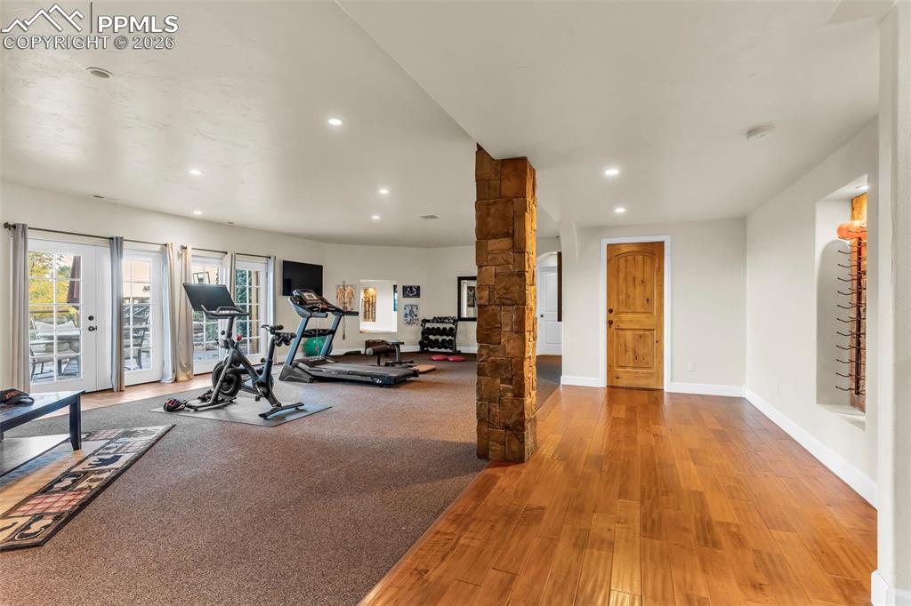 204 Storm Ridge Drive Canon City, CO 81212 - Photo 30 of 50 a view of a room with gym equipment and floor to ceiling window
