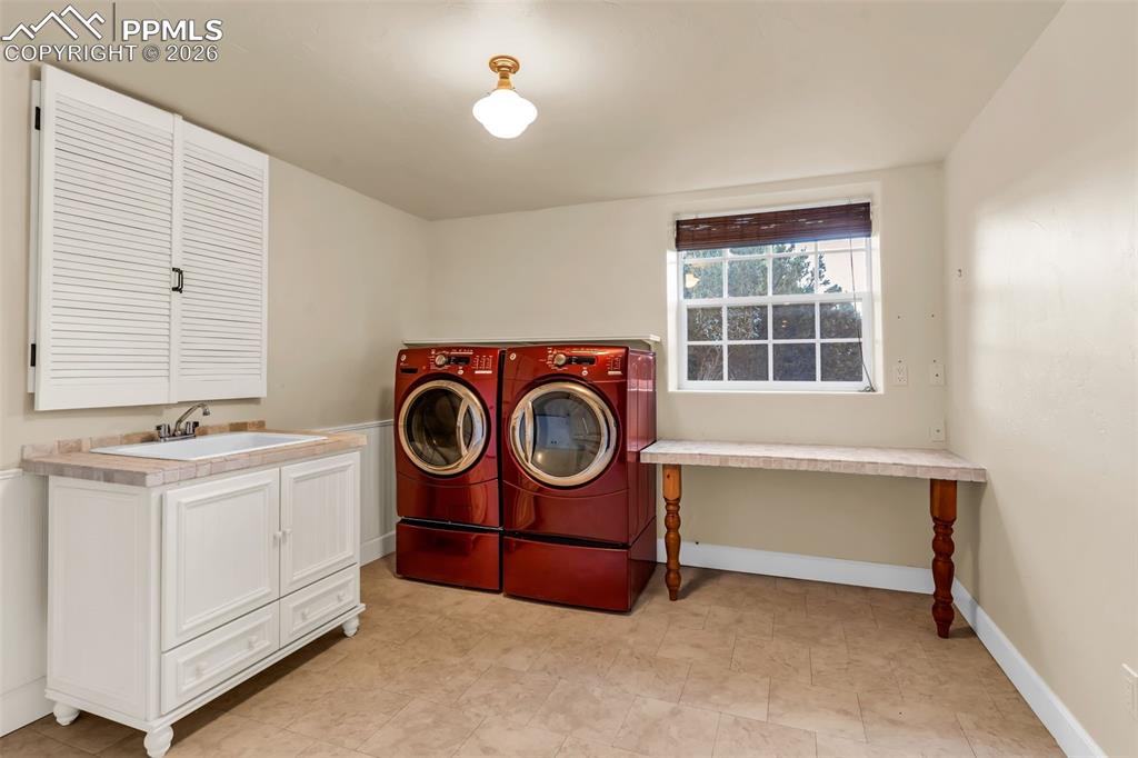 204 Storm Ridge Drive Canon City, CO 81212 - Photo 36 of 50 a utility room with dryer and washer