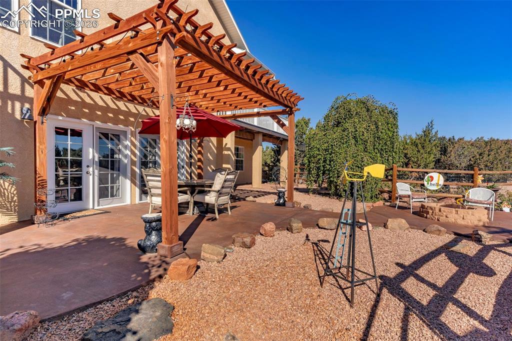 204 Storm Ridge Drive Canon City, CO 81212 - Photo 41 of 50 a view of a backyard with a patio