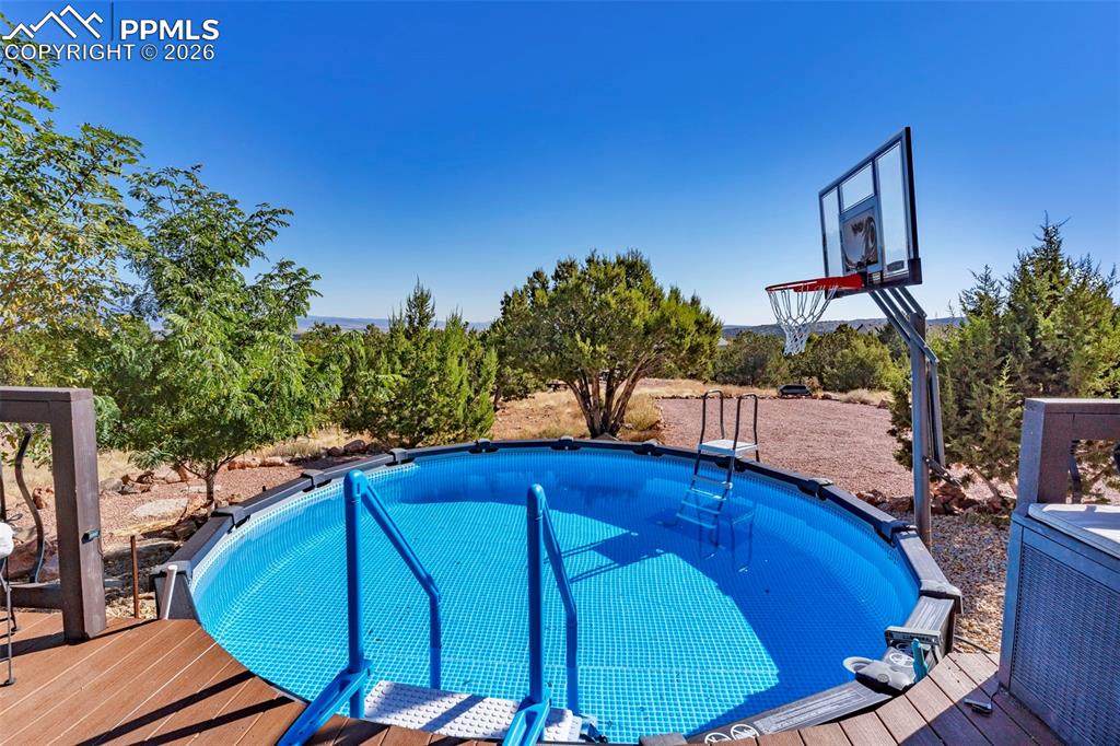 204 Storm Ridge Drive Canon City, CO 81212 - Photo 47 of 50 a view of a swimming pool with a patio