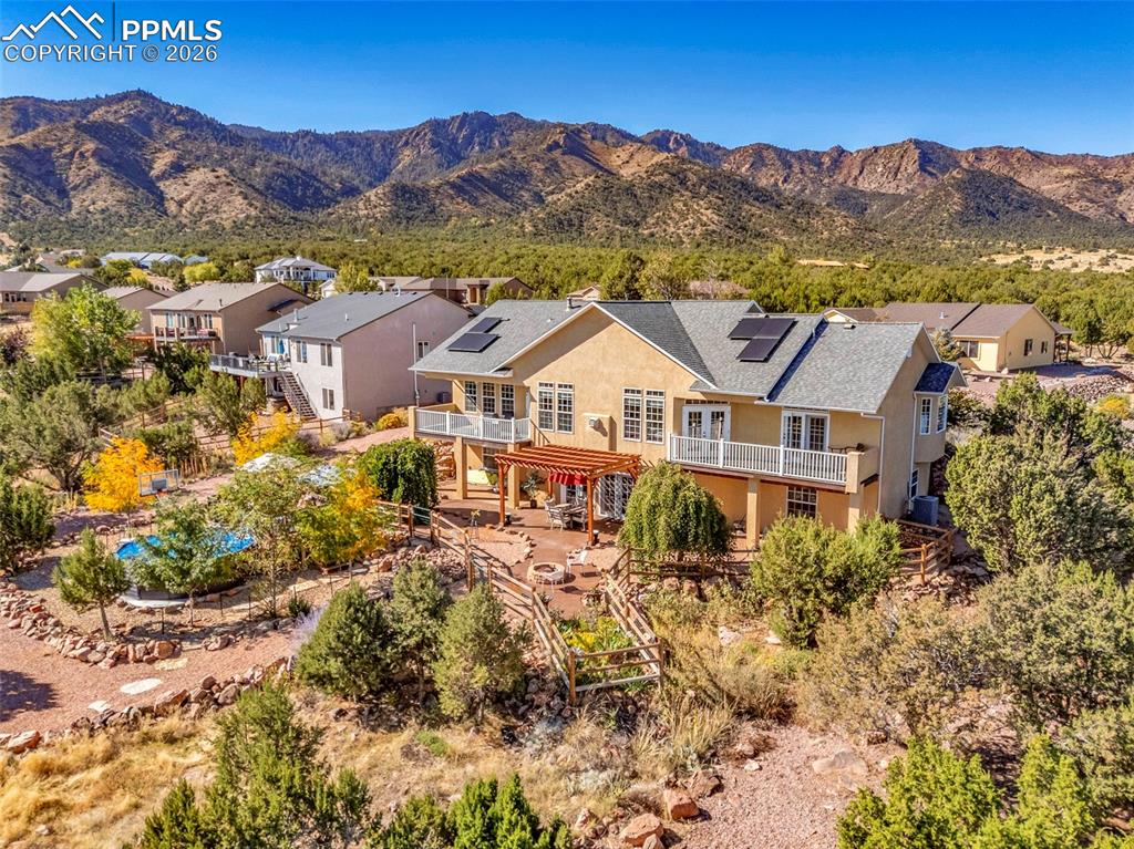 204 Storm Ridge Drive Canon City, CO 81212 - Photo 50 of 50 an aerial view of residential houses with outdoor space and trees