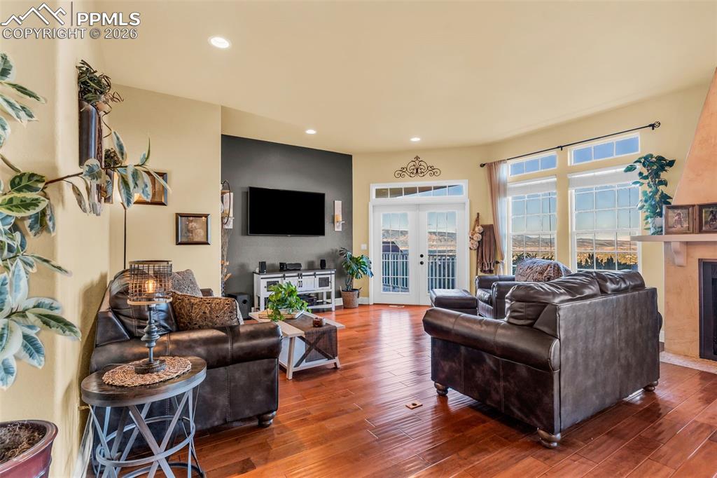 204 Storm Ridge Drive Canon City, CO 81212 - Photo 8 of 50 a living room with furniture flat screen tv and a large window