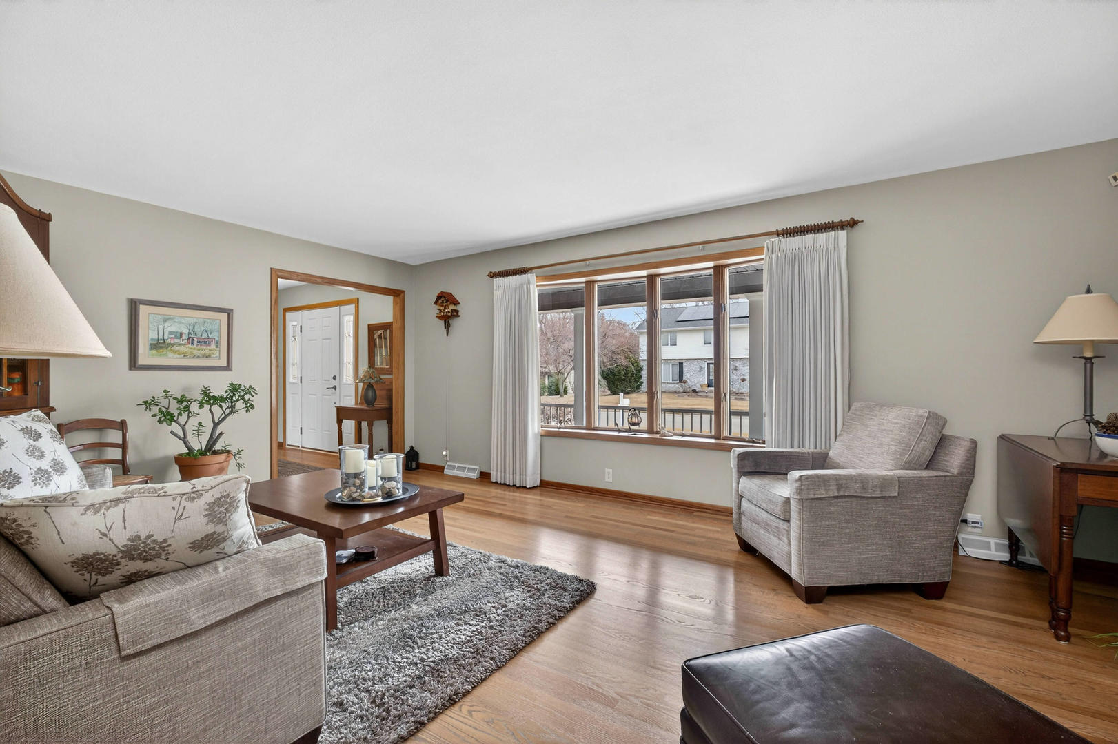 3615 74th Street Moline, IL 61265 - Photo 13 of 44 a living room with furniture and a large window