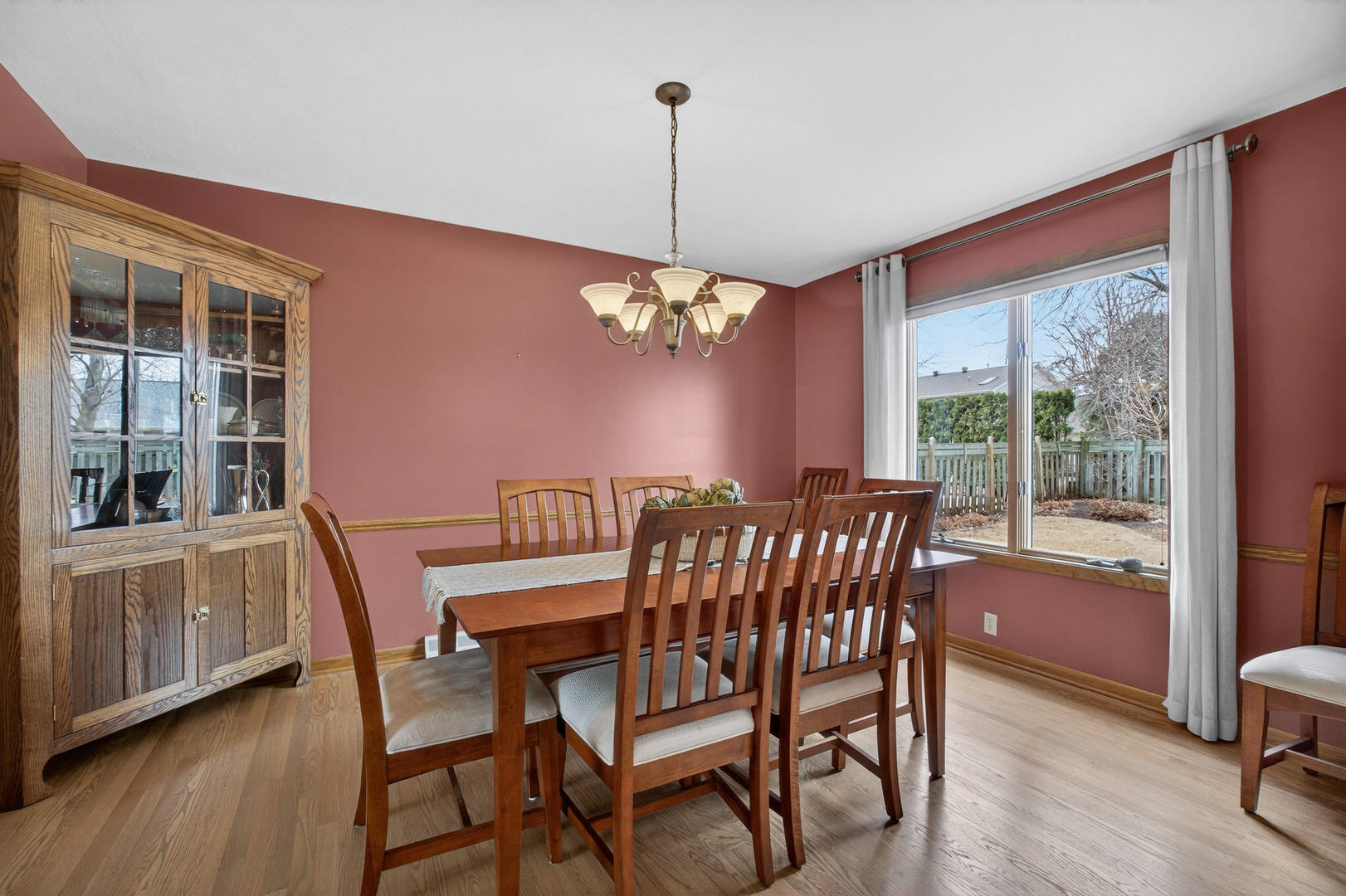 3615 74th Street Moline, IL 61265 - Photo 14 of 44 a view of a dining room with furniture window and wooden floor