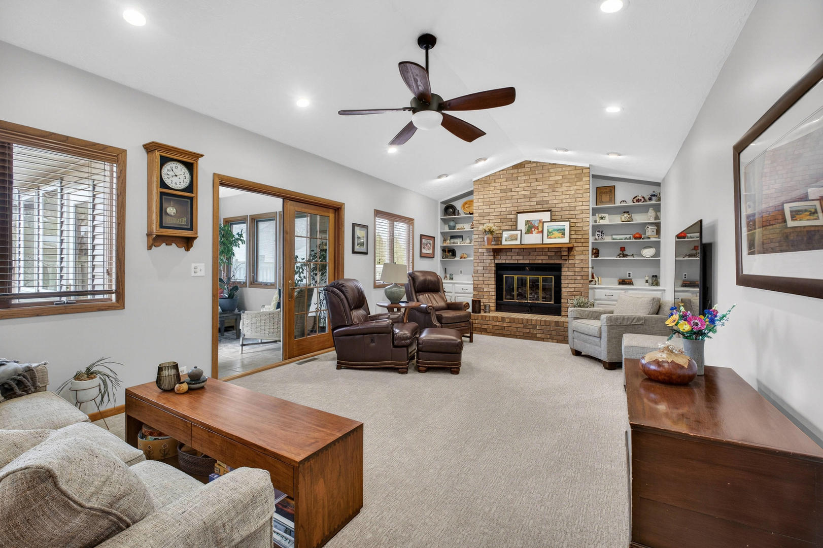 3615 74th Street Moline, IL 61265 - Photo 22 of 44 a living room with furniture fireplace and flat screen tv