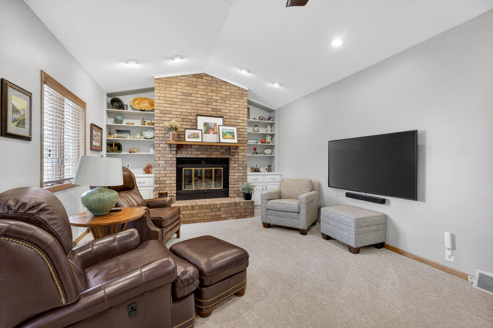 3615 74th Street Moline, IL 61265 - Photo 23 of 44 a living room with furniture and a flat screen tv