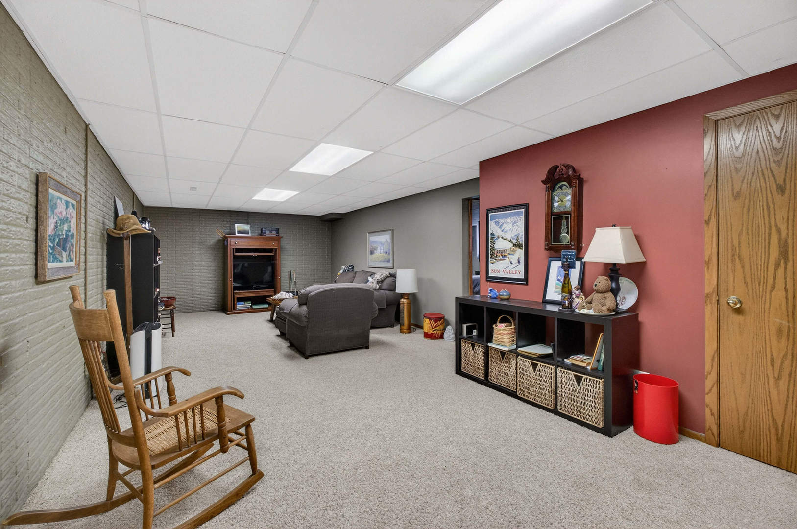 3615 74th Street Moline, IL 61265 - Photo 35 of 44 a living room with furniture and a flat screen tv