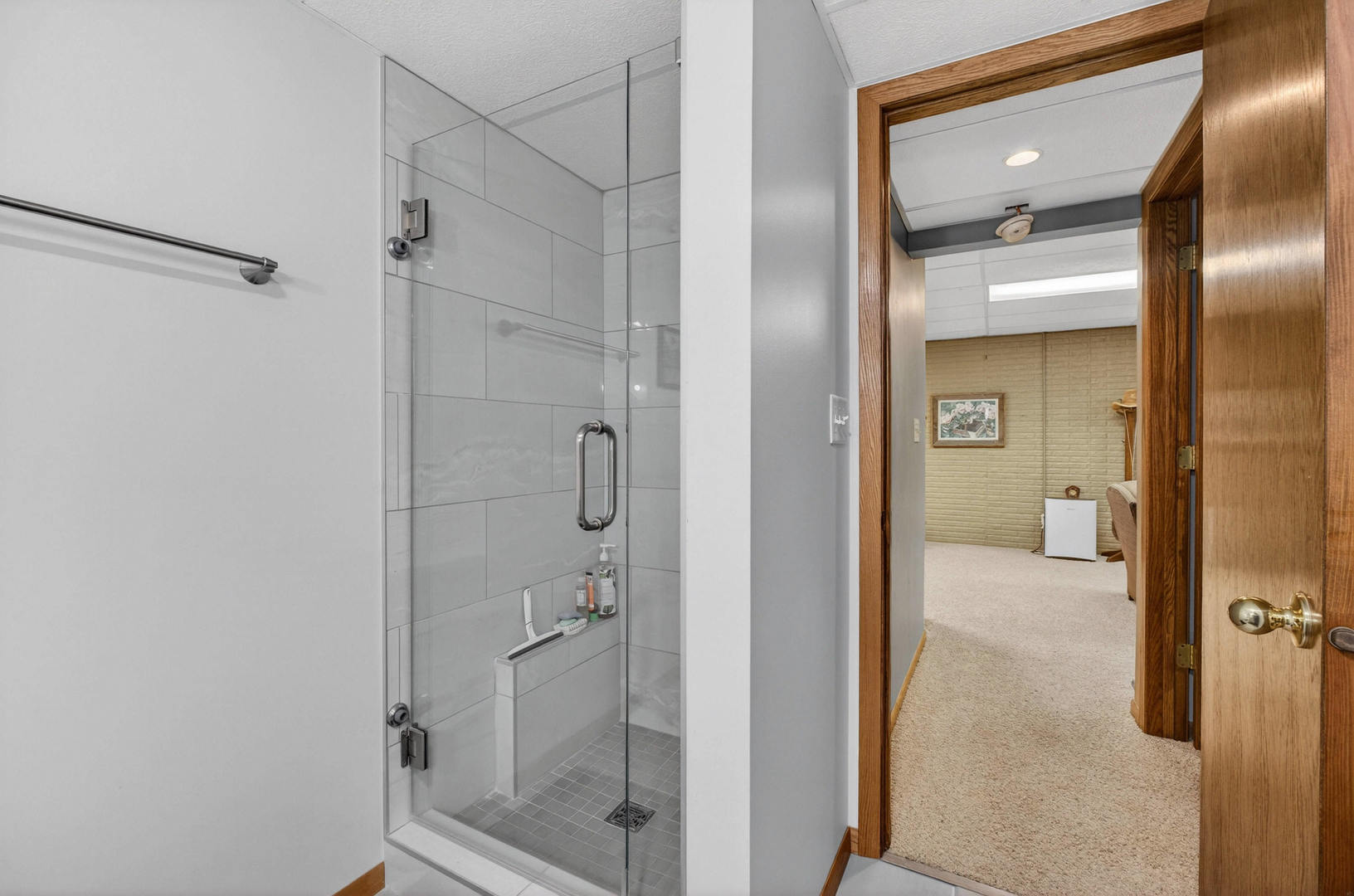 3615 74th Street Moline, IL 61265 - Photo 39 of 44 a bathroom with a glass shower door and a sink