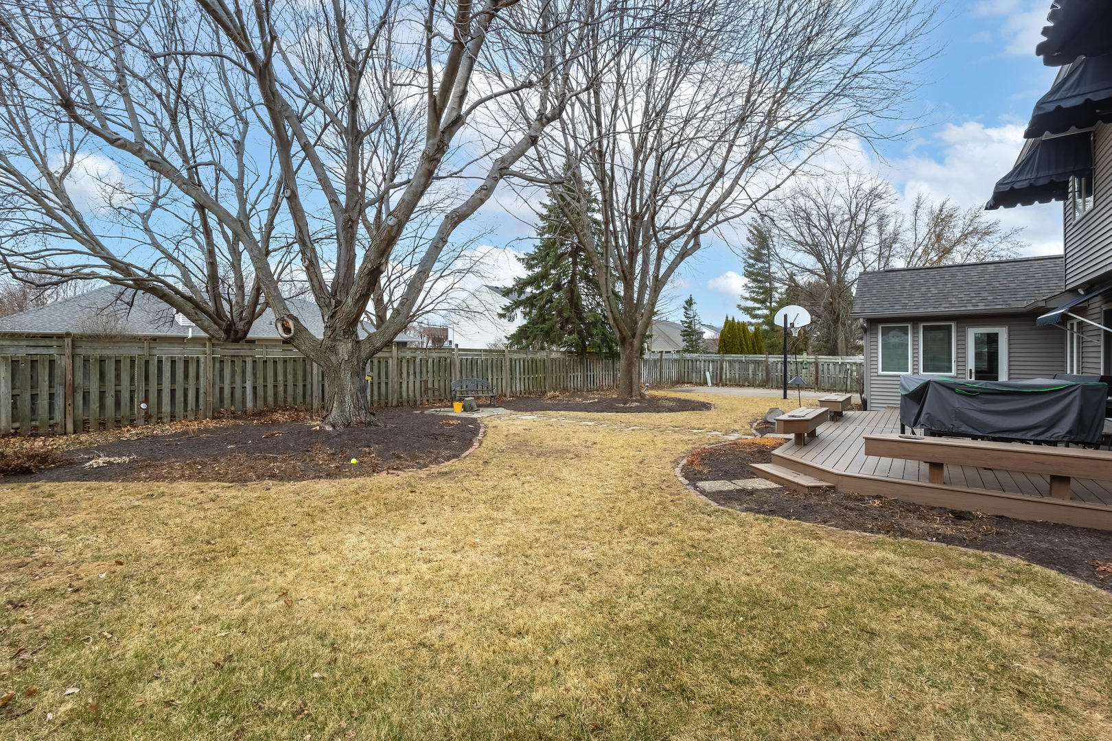 3615 74th Street Moline, IL 61265 - Photo 41 of 44 a view of a yard with a house and large trees