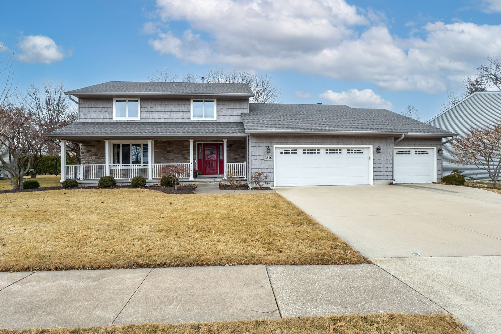 3615 74th Street Moline, IL 61265 - Photo 5 of 44 a front view of a building with garden