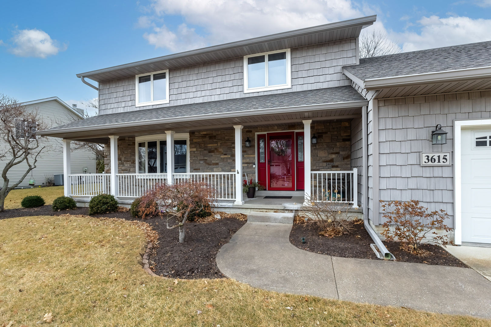 3615 74th Street Moline, IL 61265 - Photo 6 of 44 a front view of a house with outdoor seating
