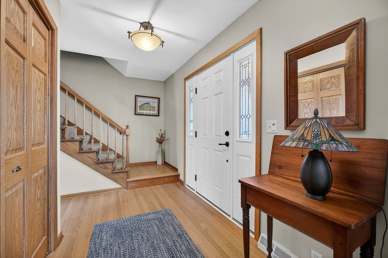 3615 74th Street Moline, IL 61265 - Photo 7 of 44 a view of entryway and hall with wooden floor
