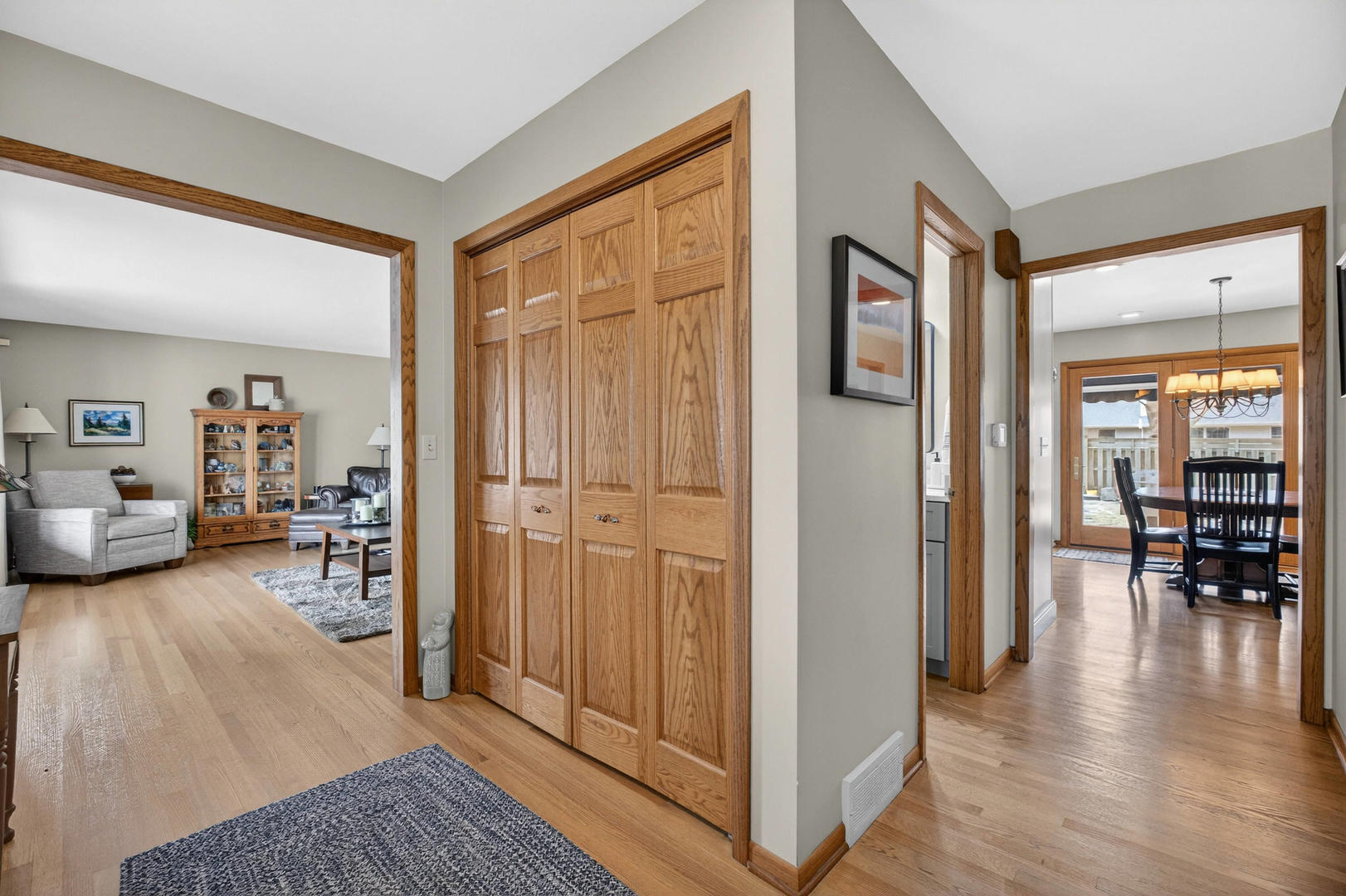 3615 74th Street Moline, IL 61265 - Photo 8 of 44 a living room with furniture and a wooden floor